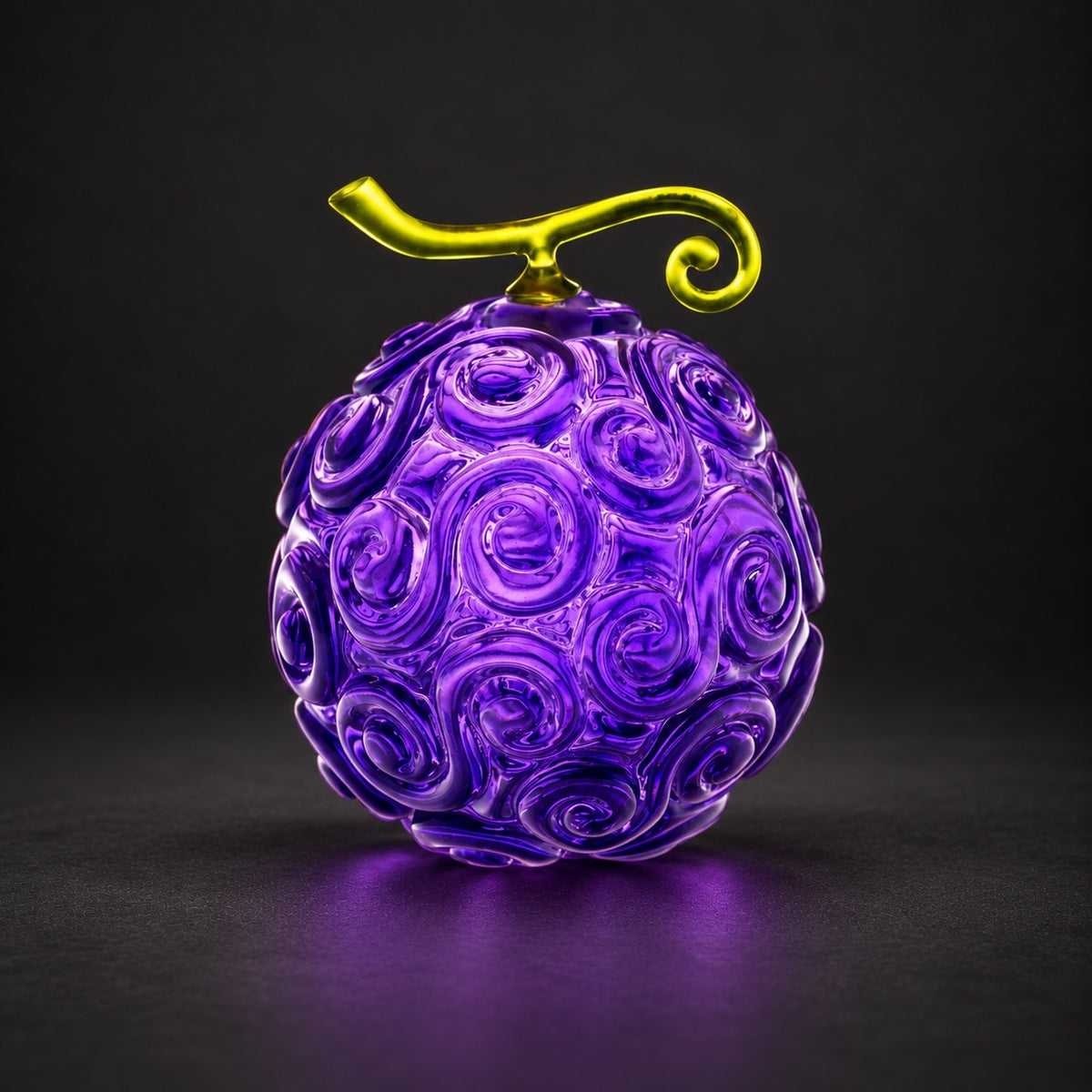 Gomu Gomu no Mi resin collectible on charcoal